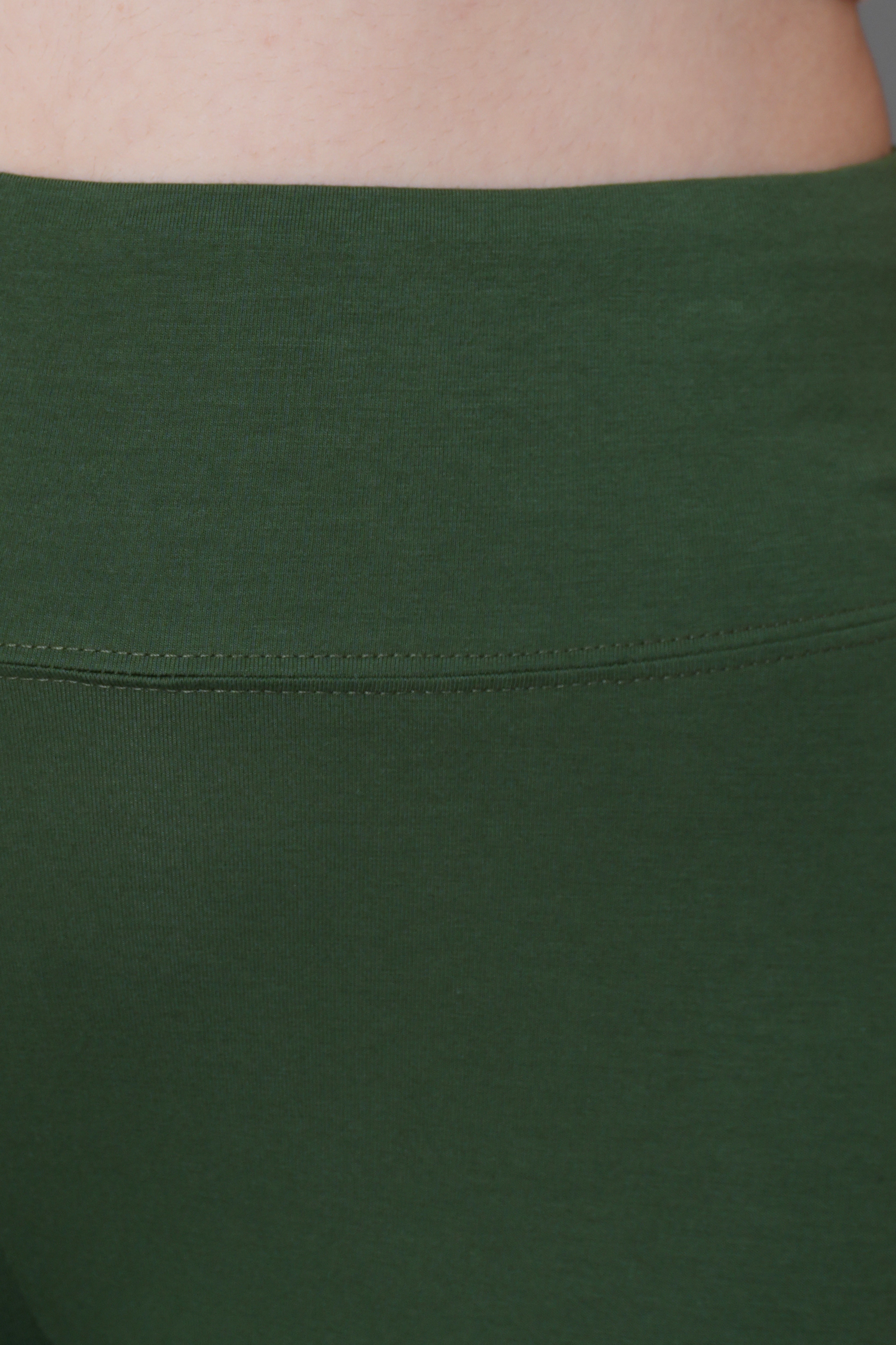 Olive stretchable biowash cotton lycra flare legging with superior elastic belt.