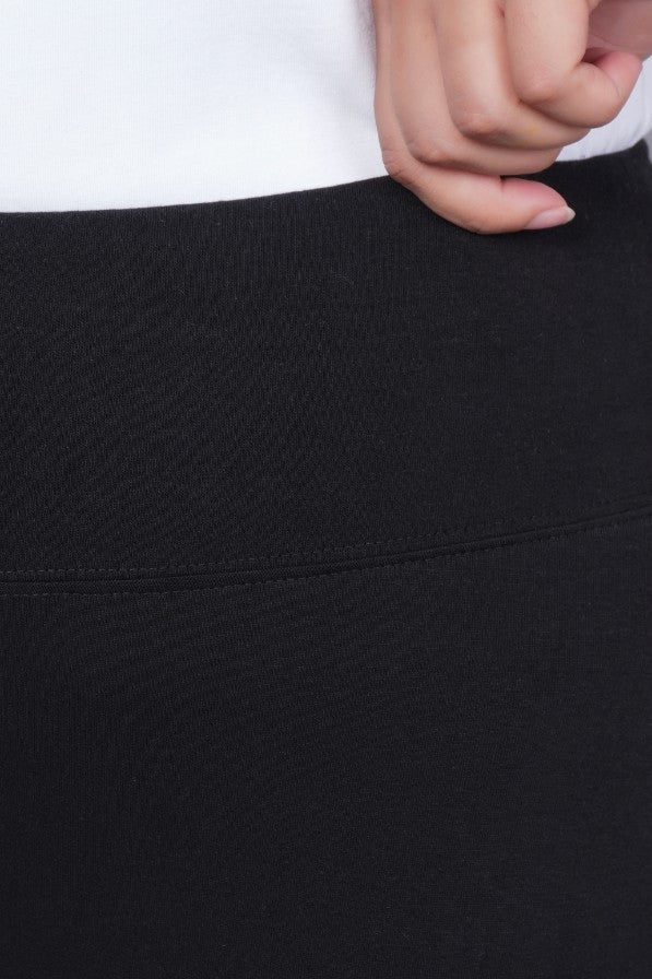 Black stretchable biowash cotton flare pants with superior elastic belt. - Cotton flare