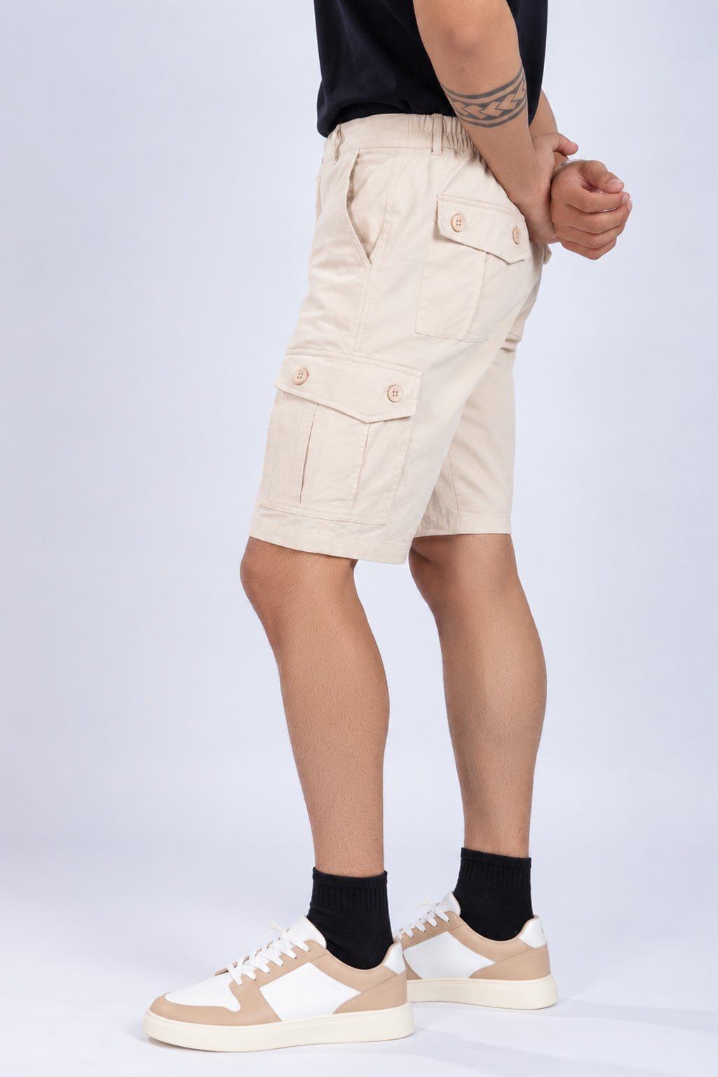 Off white stretchable biowash HQ cotton travel shorts with superior elastic belt. -Travel shorts