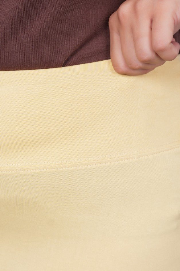 Tan stretchable biowash cotton flare pants with superior elastic belt. - Cotton flare