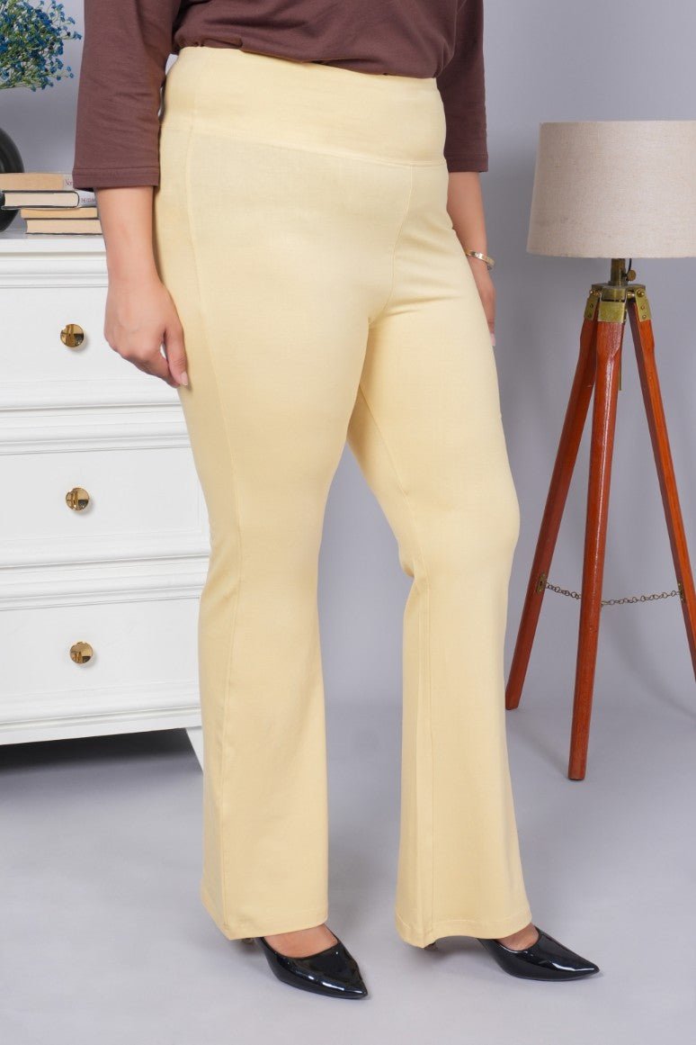 Tan stretchable biowash cotton flare pants with superior elastic belt. - Cotton flare