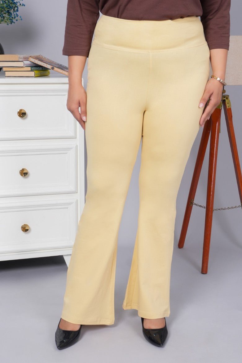 Tan stretchable biowash cotton flare pants with superior elastic belt. - Cotton flare
