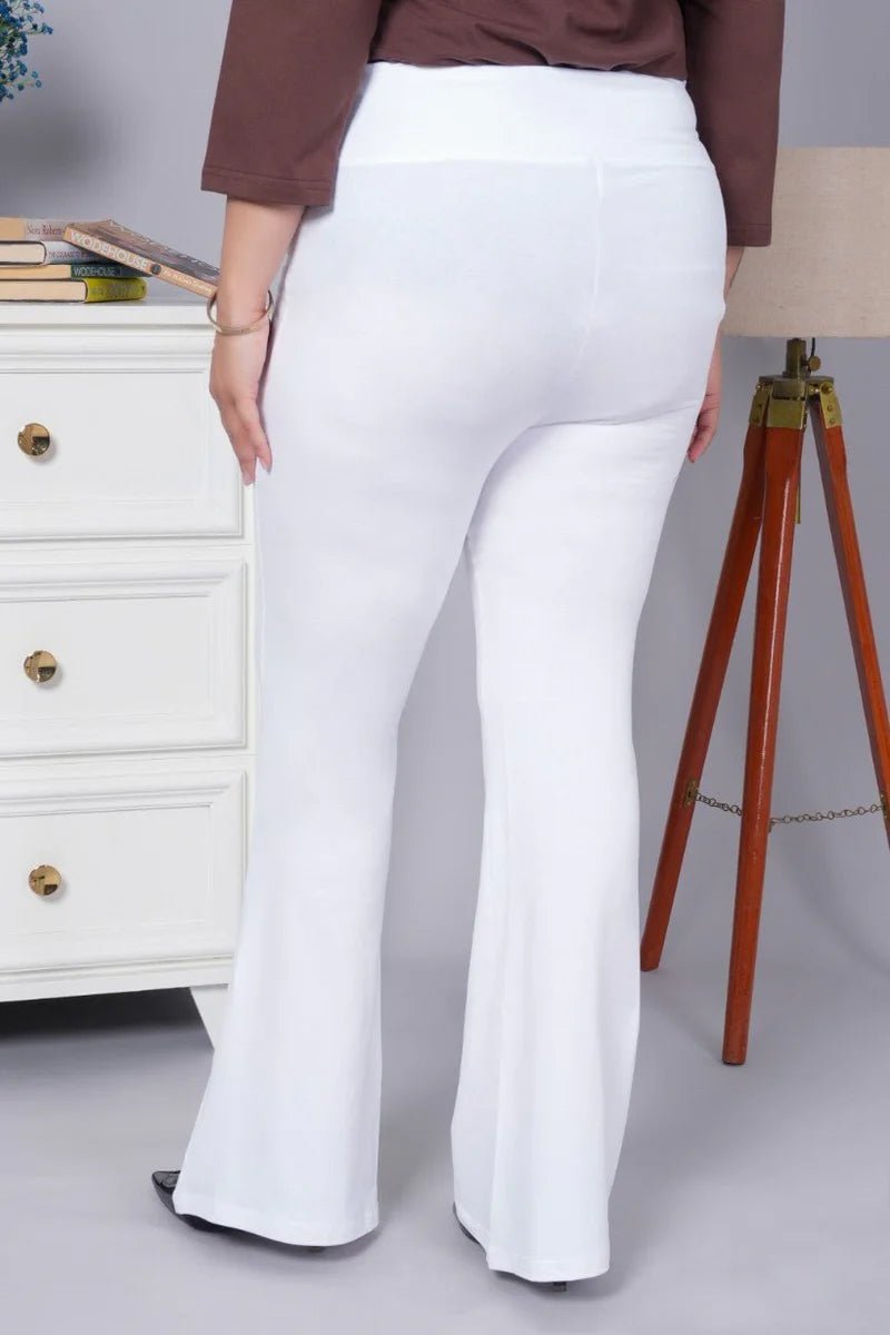 White stretchable biowash cotton lycra flare legging with superior elastic belt. -Cotton flare