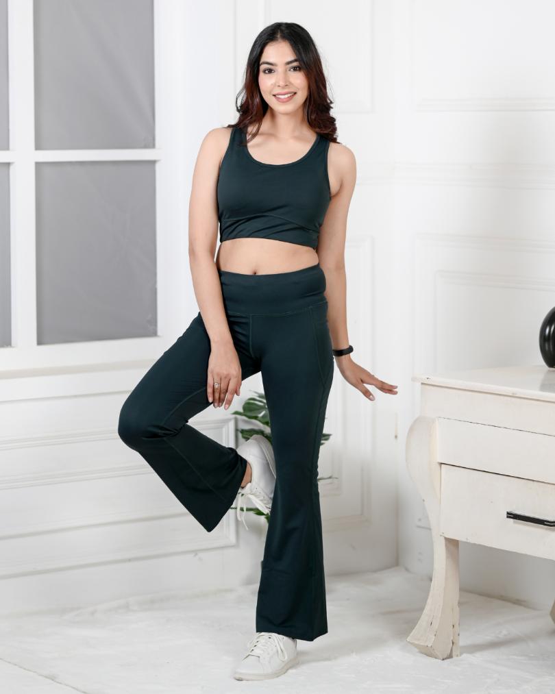 Green gym flare pants for women, ankle length sports pants.