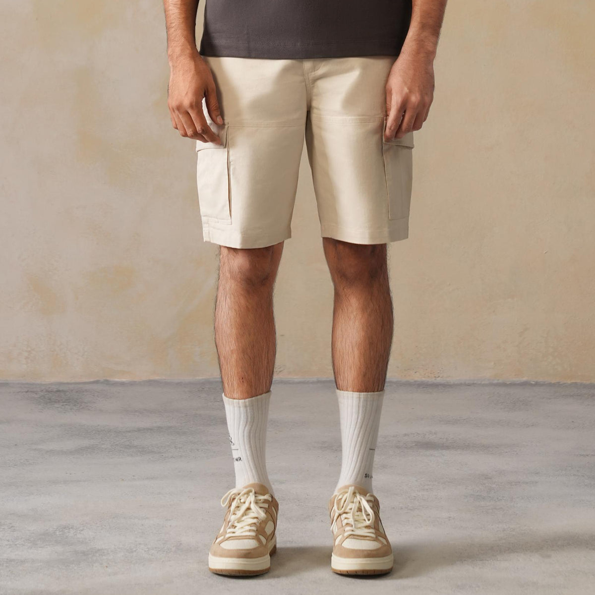 Men off white stretchable biowash HQ cotton travel shorts with superior elastic belt.