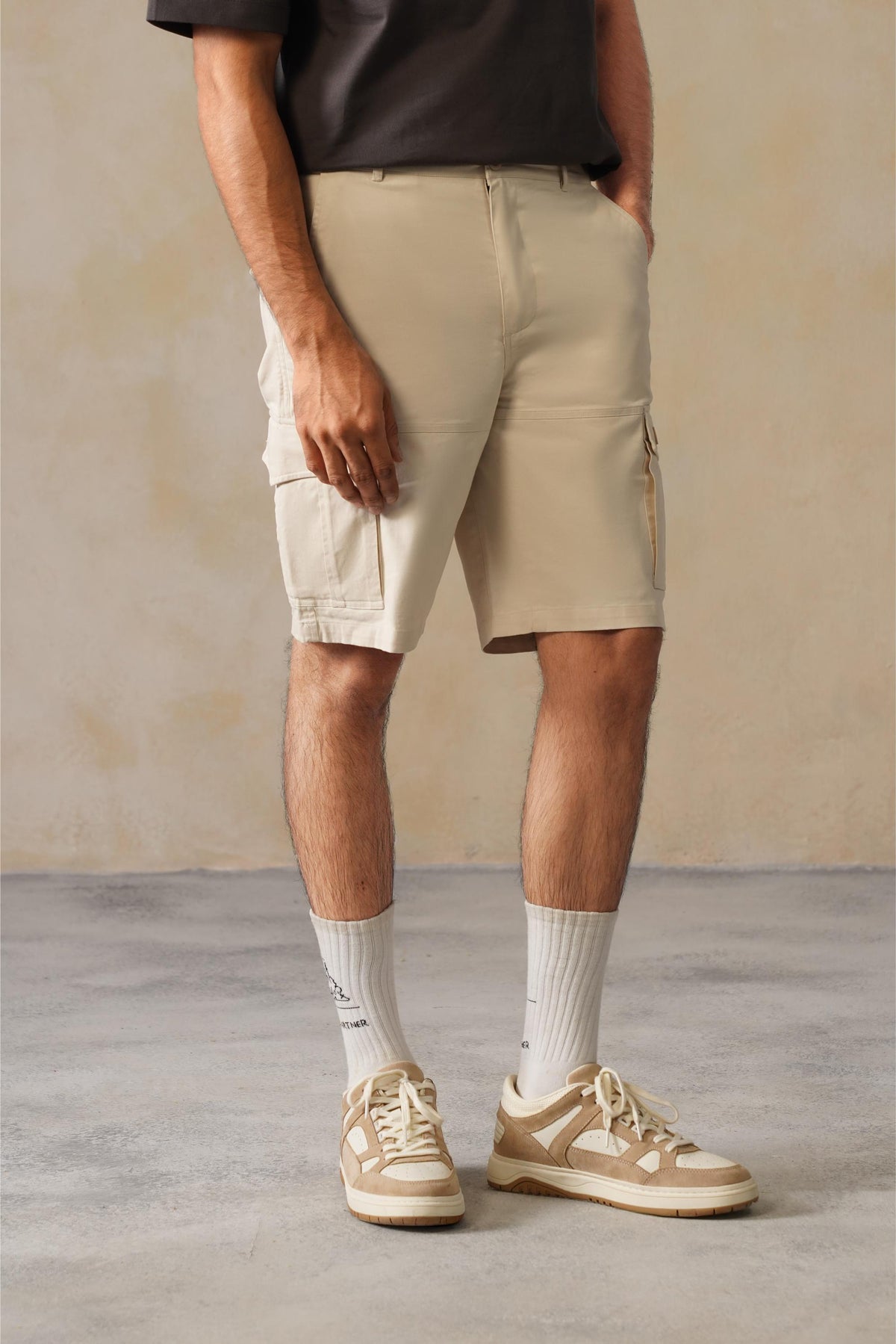 Men off white stretchable biowash HQ cotton travel shorts with superior elastic belt.