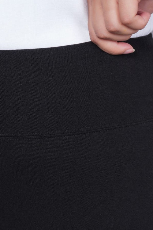 Black stretchable biowash cotton lycra flare legging with superior elastic belt. -Cotton flare