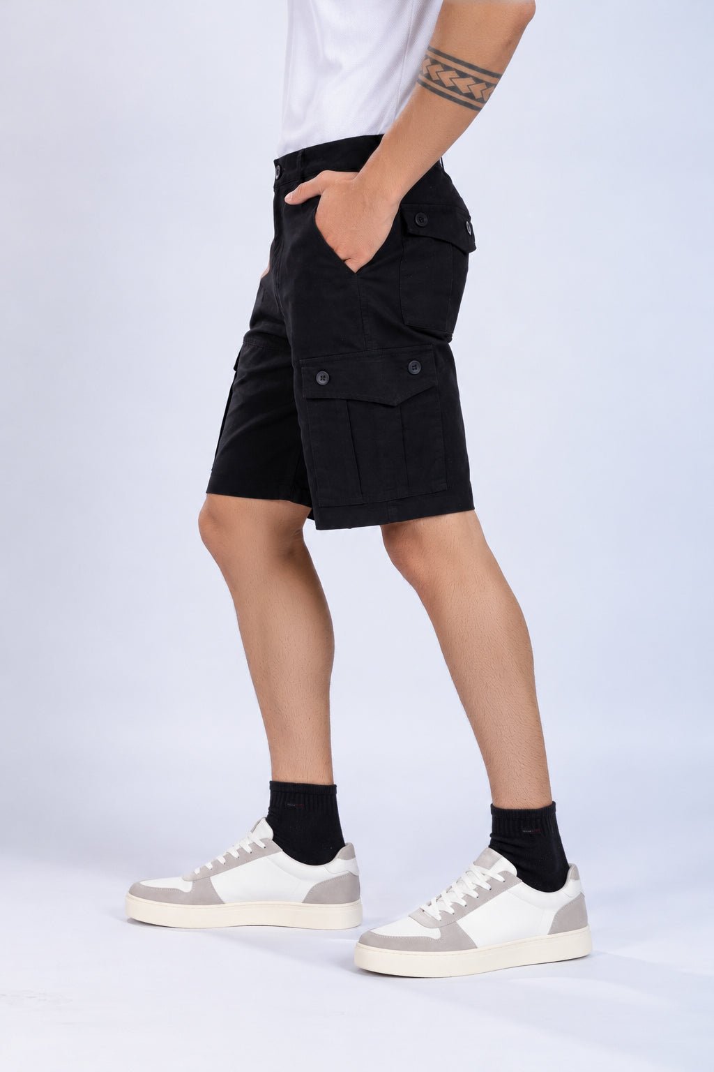 Black stretchable biowash HQ cotton travel shorts with superior elastic belt. -Travel shorts