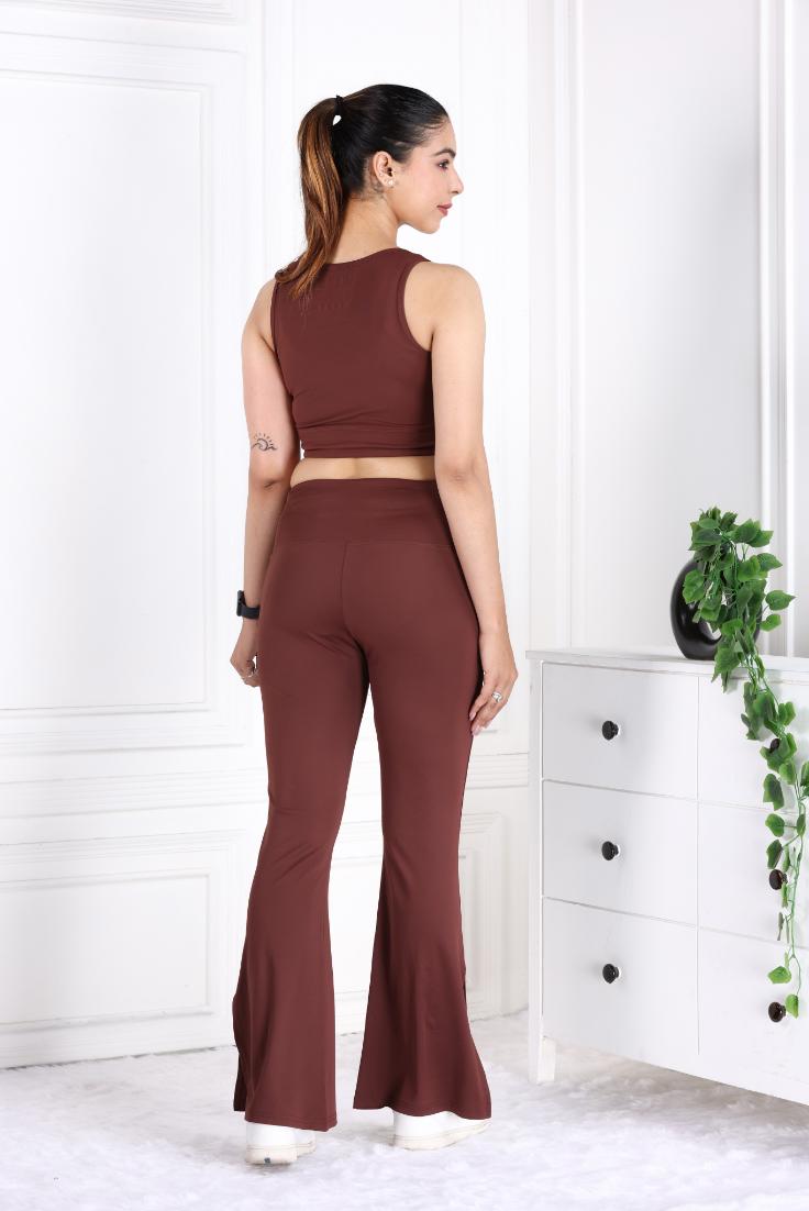 Dark brown sports flare pants with slit for women, ankle length gym pants.