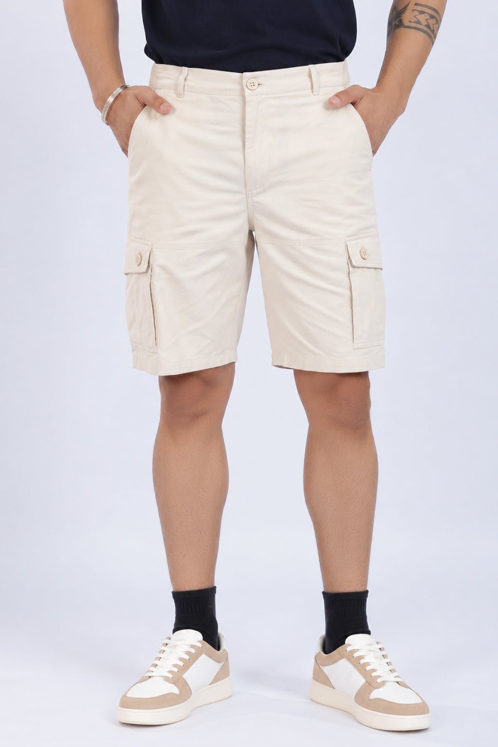 Off white stretchable biowash HQ cotton travel shorts with superior elastic belt. -Travel shorts