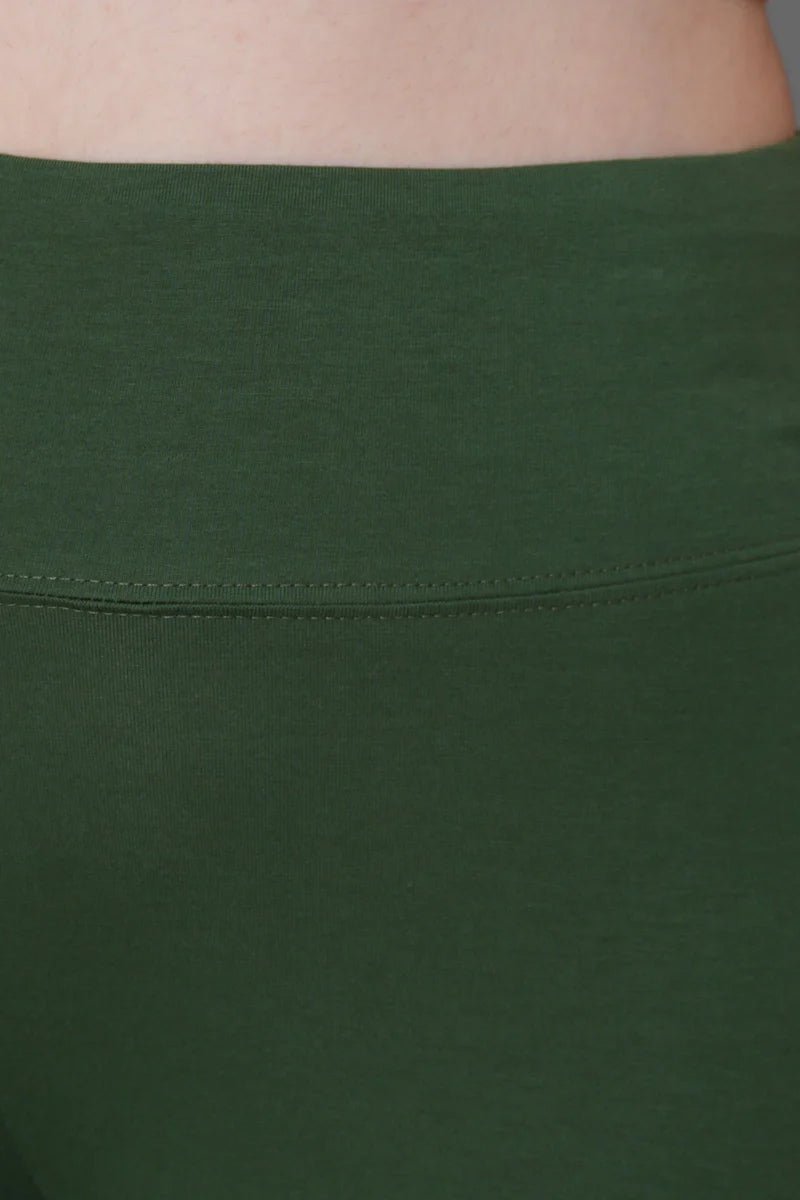 Olive stretchable biowash cotton lycra flare legging with superior elastic belt. -Cotton flare