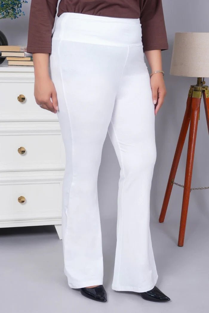 White stretchable biowash cotton lycra flare legging with superior elastic belt. -Cotton flare